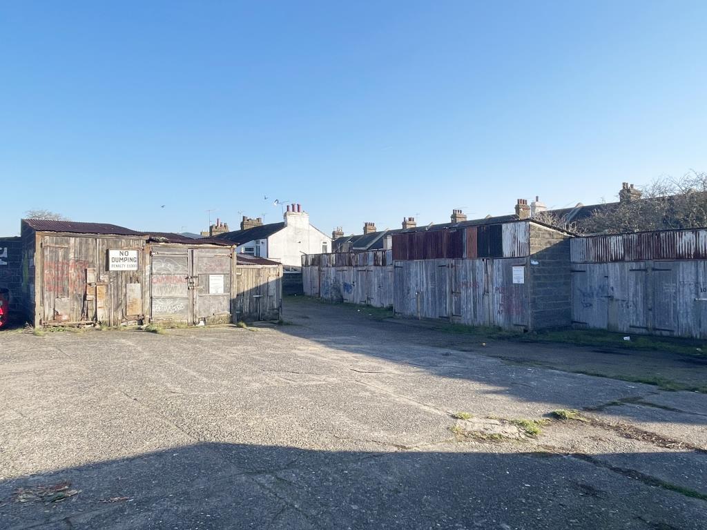 Lot: 83 - LAND WITH PLANNING FOR FIVE HOUSES - Garage site with planning for redevelopment